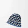 Buckethat med virkad patch i raffia och kalvskinn Buckethat med virkad patch i raffia och kalvskinn
