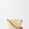 Eclipse-pochette i raffia och kalvskinn Eclipse-pochette i raffia och kalvskinn