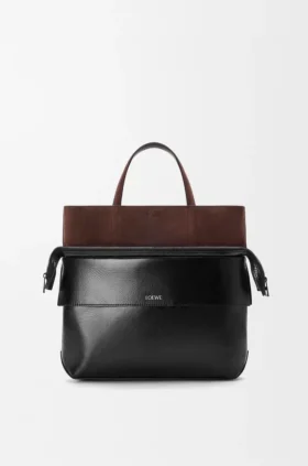 Liten Switch-toteväska i papperkalvskinn och mocka
