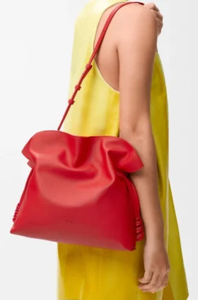 Medium Coil Flamenco-clutch i nappa-kalvskinn